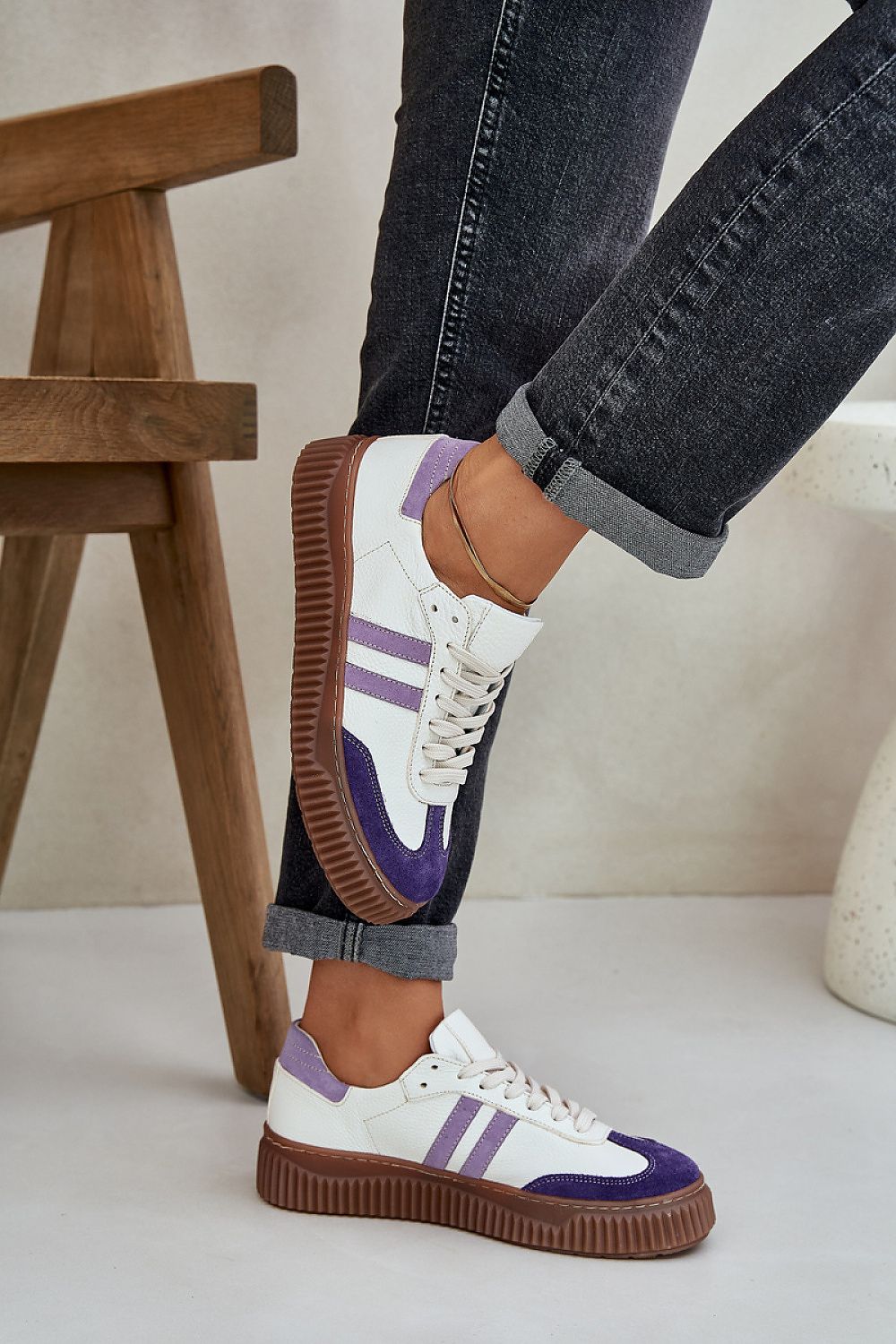 Fashionable women's sneakers by Step in Style, featuring a soft leather footbed and trendy platform, perfect for any wardrobe.