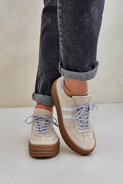 Side profile of luxury women's natural leather sneakers by Step in Style, demonstrating the stylish low profile and versatile design for everyday wear.