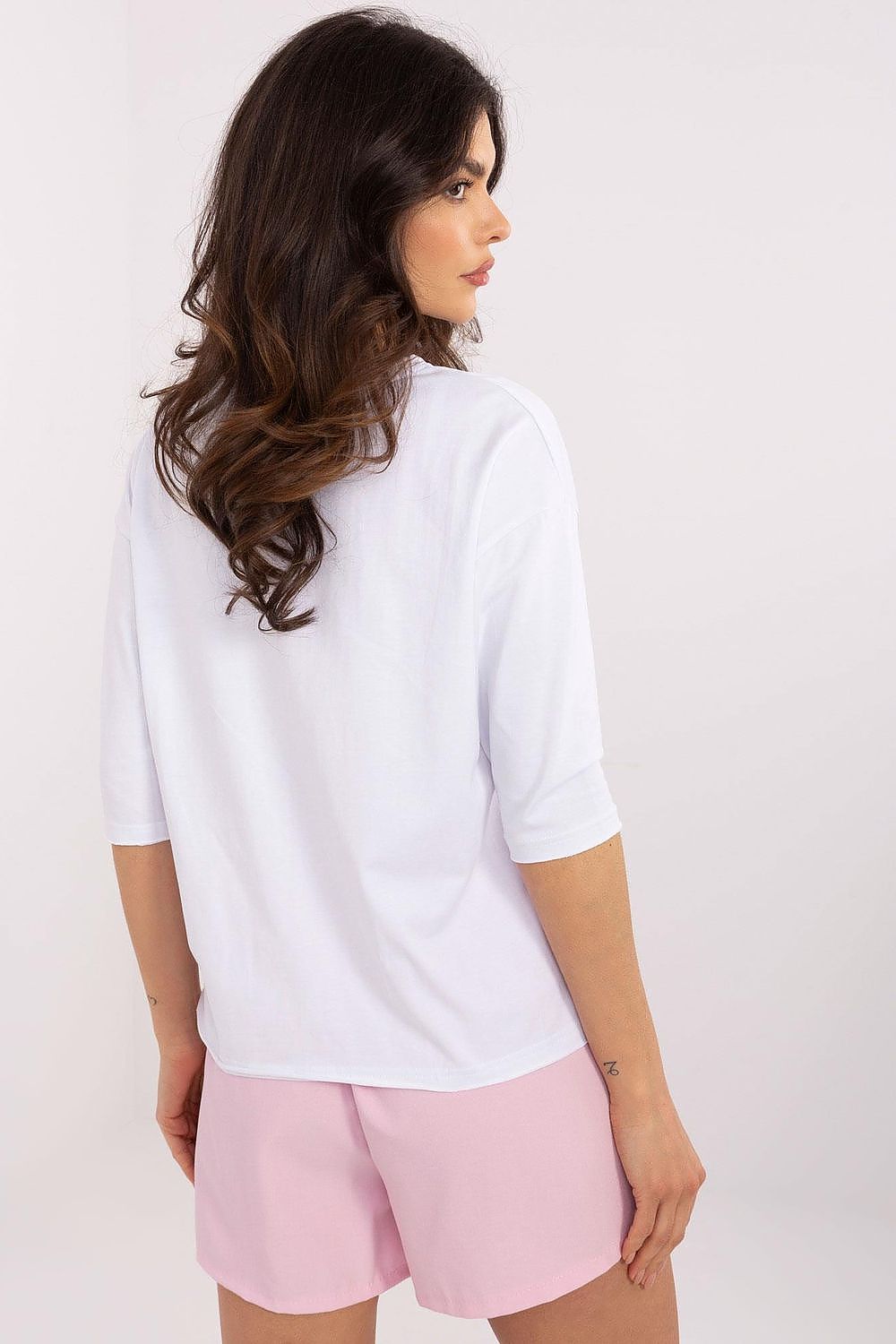 Close-up view of the luxurious print design on the Factory Price cotton blouse, showcasing intricate patterns and inscriptions.