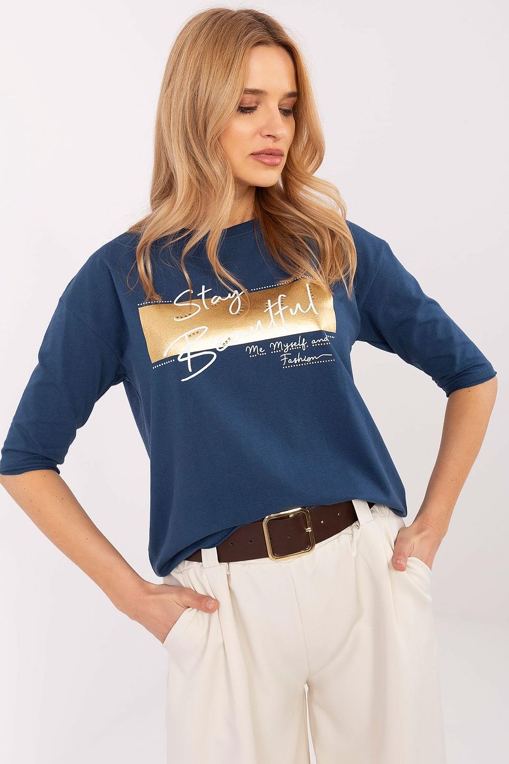 Factory Price elegant women's blouse displayed on a hanger, showcasing the round neckline and 3/4 sleeves, perfect for pairing with jeans or skirts for a chic casual outfit.