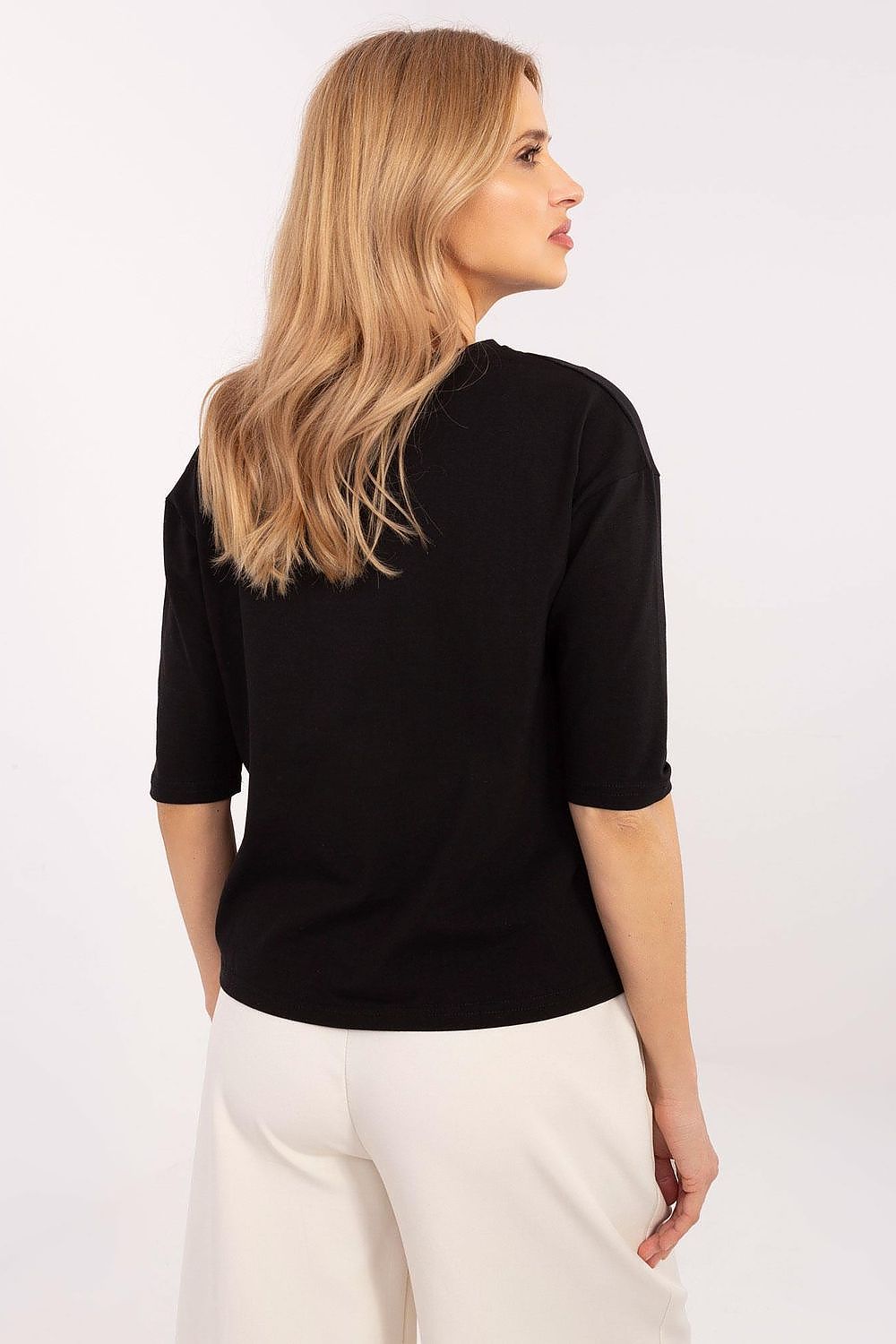 Luxurious cotton blend blouse with a fashionable animal print, designed by Factory Price, showcasing a flattering fit and trendy 3/4 sleeves.