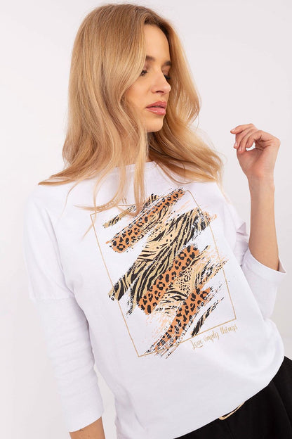 Fashionable longer length blouse with comfortable fit and stylish animal motif, available in multiple sizes from Factory Price.