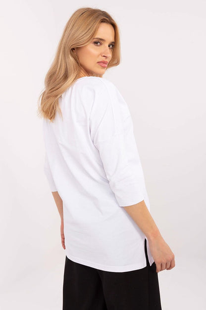 Chic extended cut blouse by Factory Price, featuring a modern animal pattern, perfect for pairing with leggings or fitted pants.