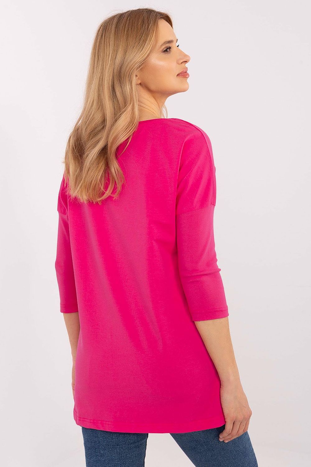 Factory Price's fashionable extended cut blouse adorned with a bold animal motif, perfect for elevating your everyday wardrobe with a touch of sophistication.