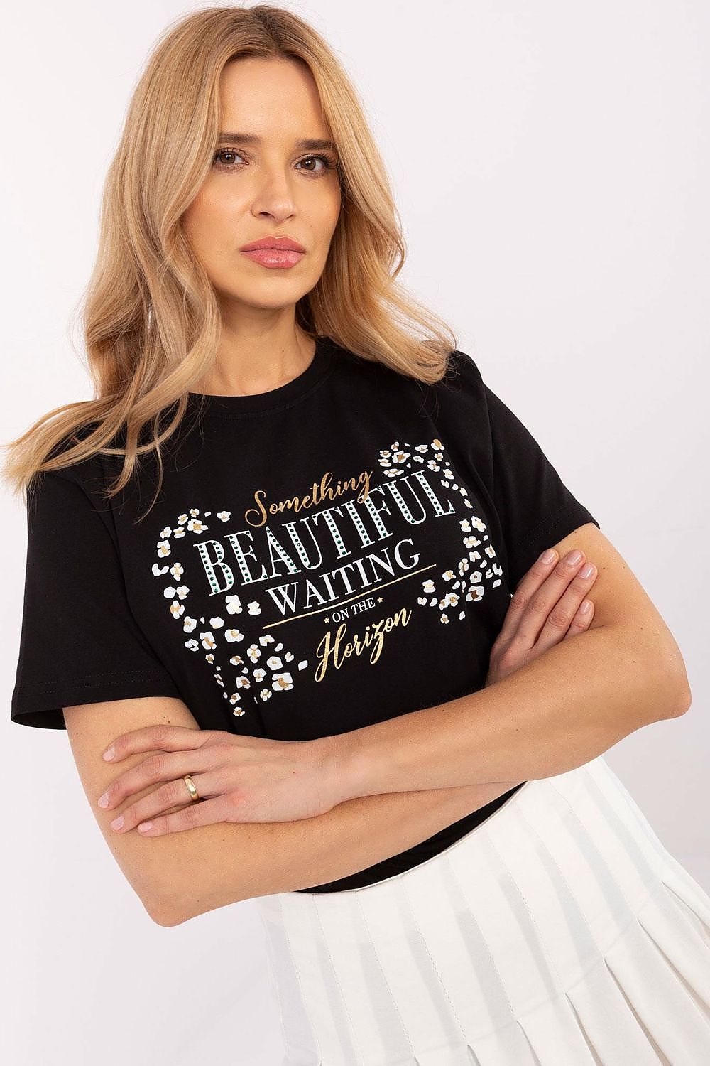 Elegant women's casual t-shirt by Factory Price, featuring a soft cotton blend, decorative studs, and a classic round neckline, available in sizes S-XL.