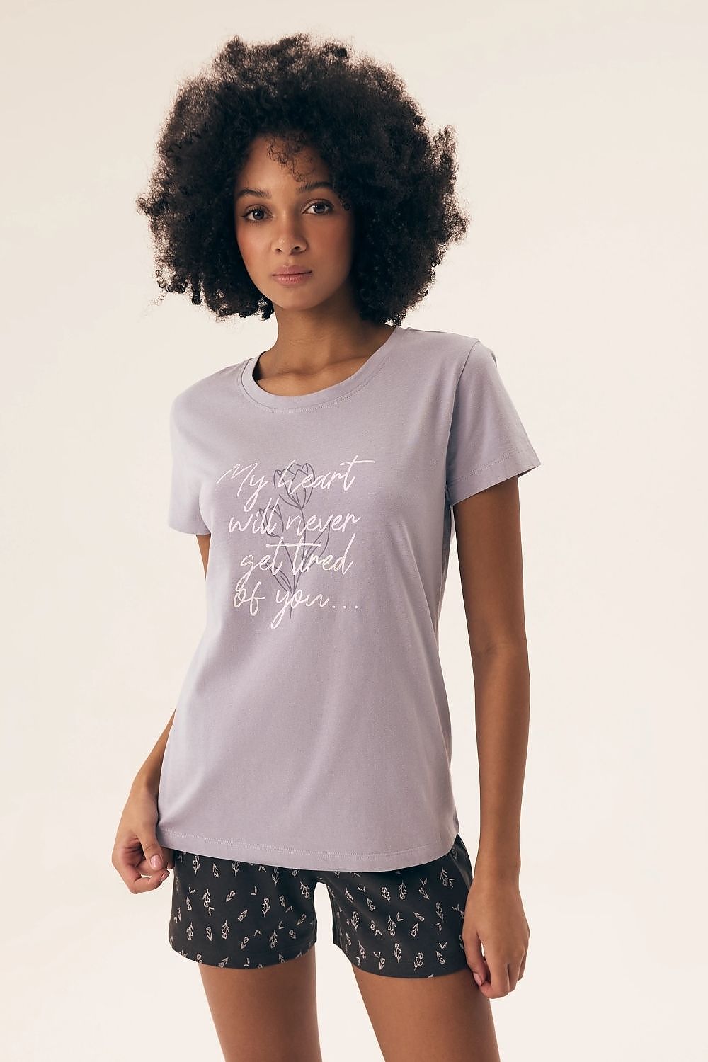 Luxury Henderson Women's Cotton Pajamas Set in soft and breathable fabric, featuring a stylish short-sleeved blouse and charming printed shorts, available in sizes S to XL for ultimate comfort.