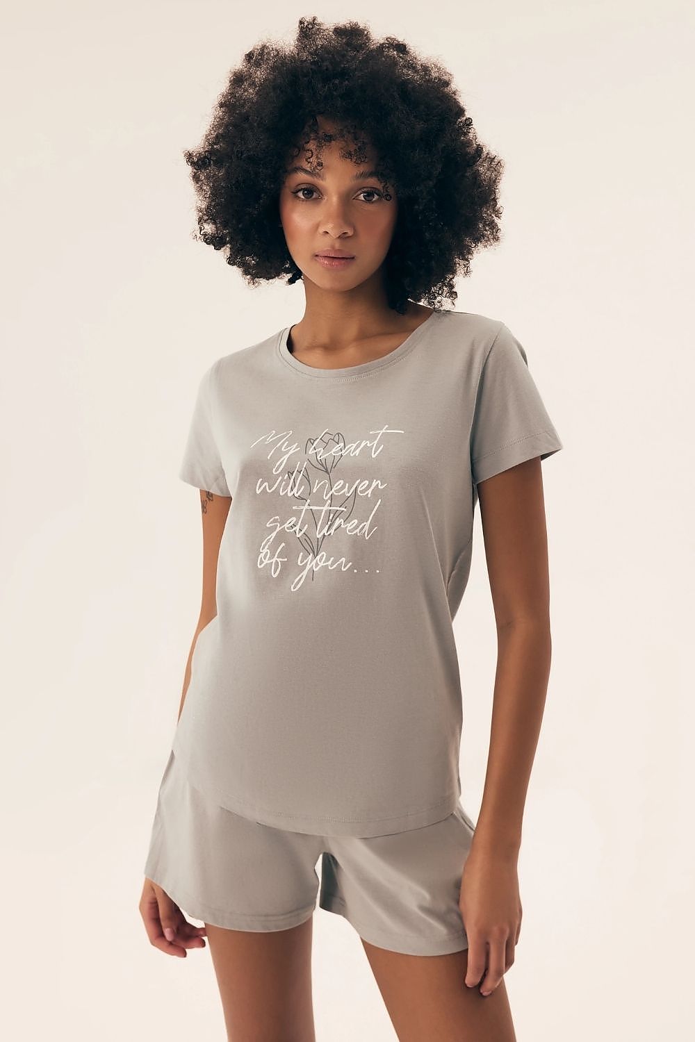 Stylish Henderson Women's Cotton Pajamas Set featuring a chic short-sleeved blouse with decorative inscription, perfect for relaxed home wear.