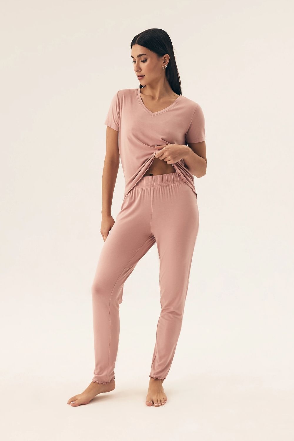 Henderson Women's Elegant Pajama Set featuring a soft V-neck top and stylish frilled long pants, showcasing luxurious comfort and exquisite design in sizes S-XL.