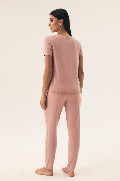Close-up view of Henderson Women's Elegant Pajama Set highlighting the delicate frill detail on the long pants and the soft texture of the breathable fabric, perfect for a luxurious night's sleep.