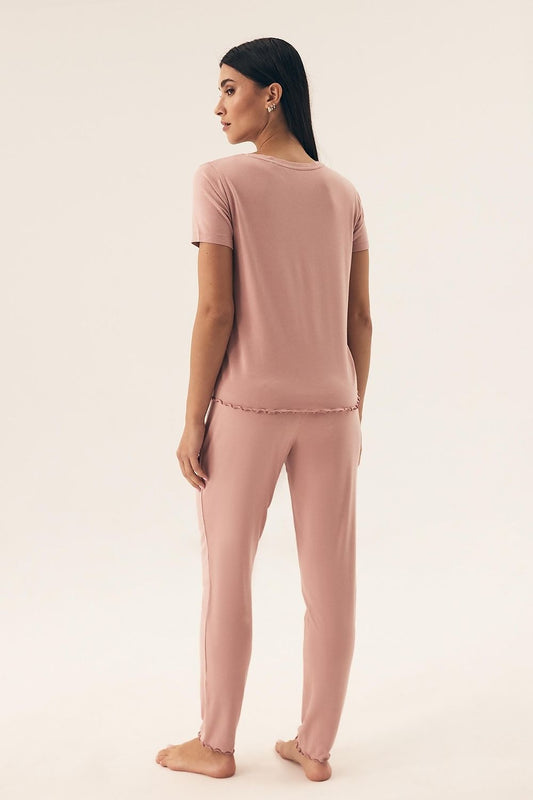 Close-up view of Henderson Women's Elegant Pajama Set highlighting the delicate frill detail on the long pants and the soft texture of the breathable fabric, perfect for a luxurious night's sleep.