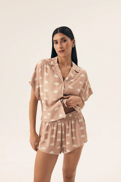 Elegantly Comfortable Ladies' Henderson Pajama Set in soft viscose fabric, showcasing a stylish short sleeve button-up top with delicate collar and chic shorts, perfect for luxurious nightwear.