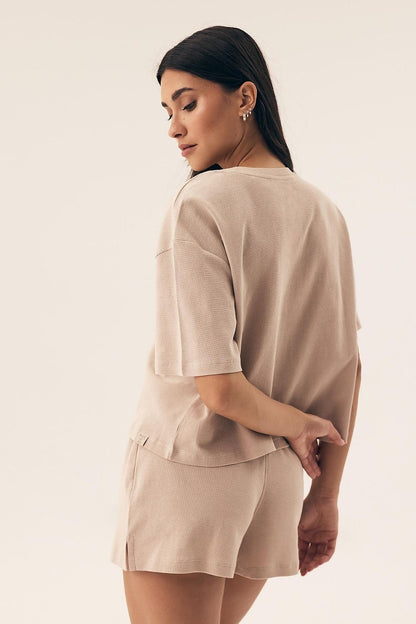 Luxury women's pajama set by Henderson featuring quilted cotton fabric, short sleeves, and loose-fitting shorts for ultimate comfort, available in sizes S-XL.