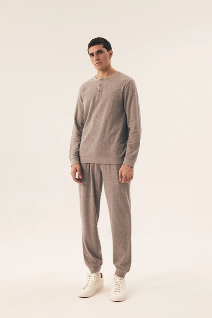 Henderson Men's Elegant Pyjamas in soft cotton blend, featuring a luxurious long-sleeved button-up top and stylish long pants with cuffs, perfect for comfortable lounging.