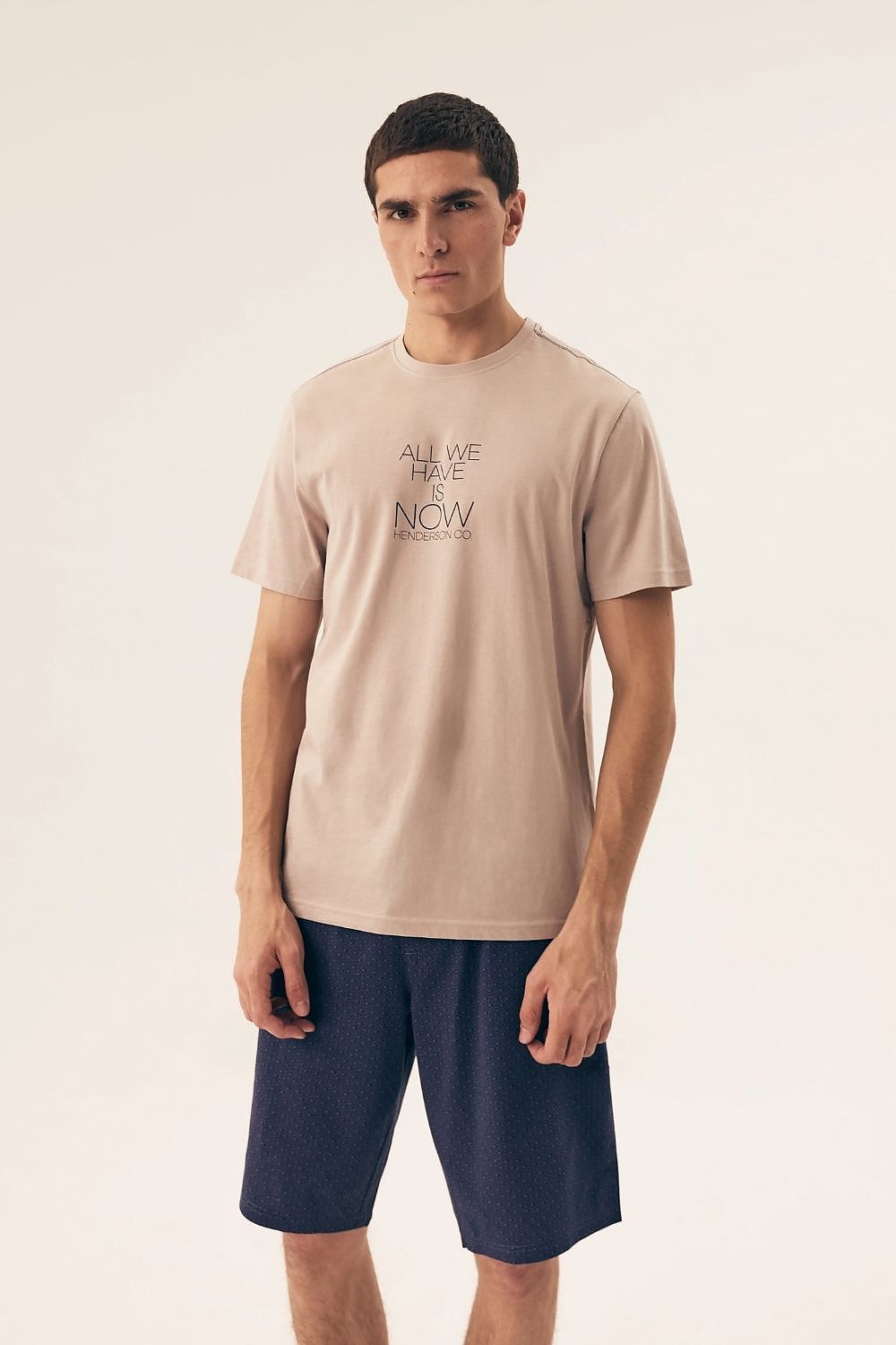 Luxury Henderson Men's Pajamas Set featuring a stylish short-sleeved top and minimalist shorts, perfect for a fashionable and comfortable nightwear experience.