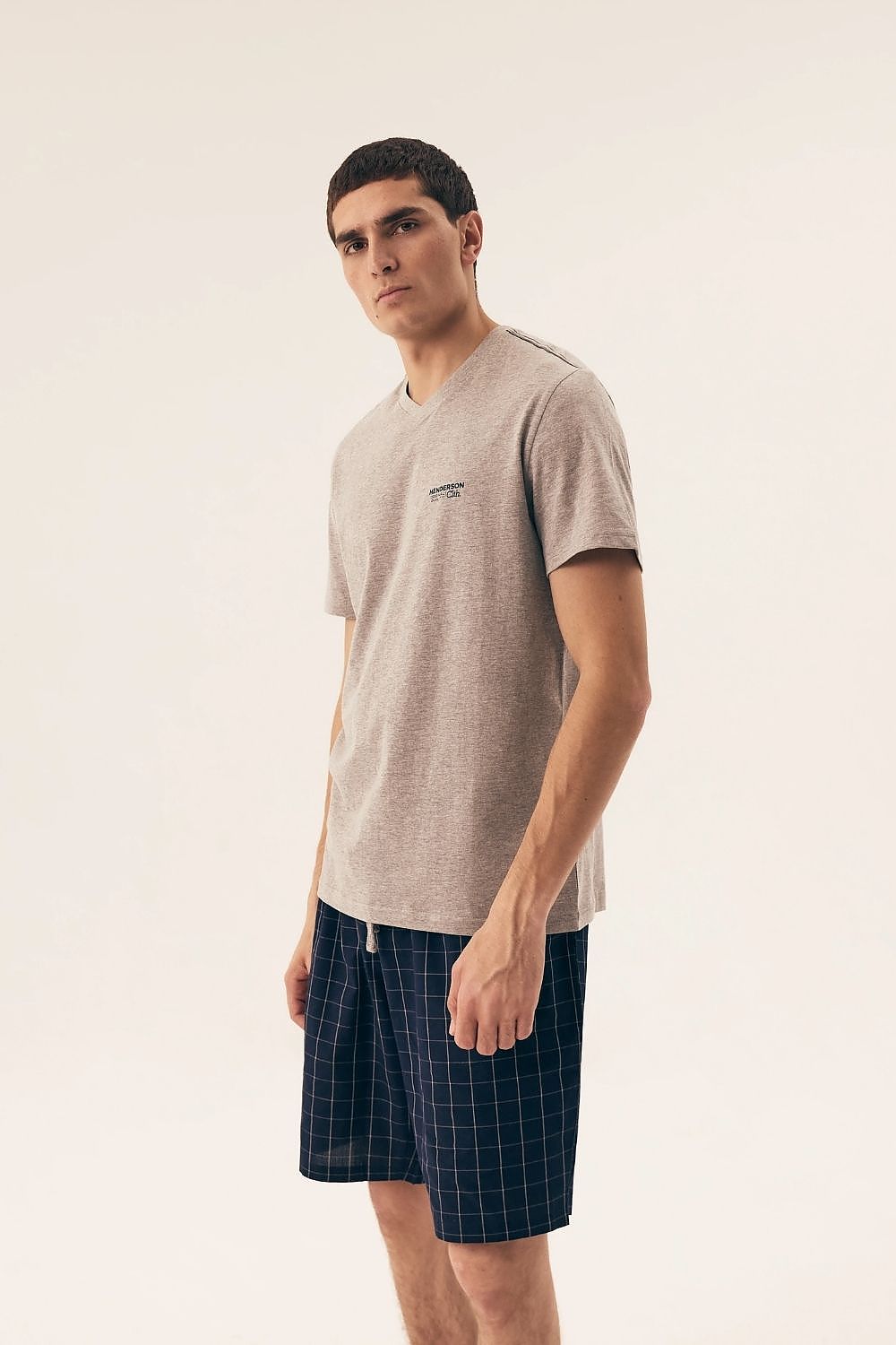 Elegant Henderson Men's Stylish Short-Sleeved Pyjamas Set in soft cotton, showcasing the fashionable V-neck design and breathable fabric, perfect for luxurious nightwear.