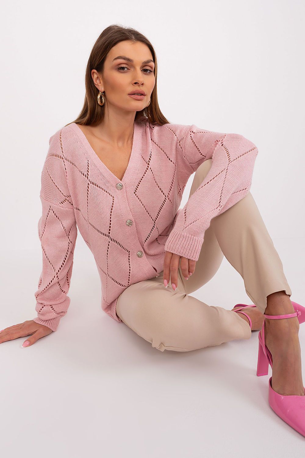 Rue Paris women's cardigan showcasing a sophisticated lace design and comfortable fit, ideal for both elegant and casual attire.