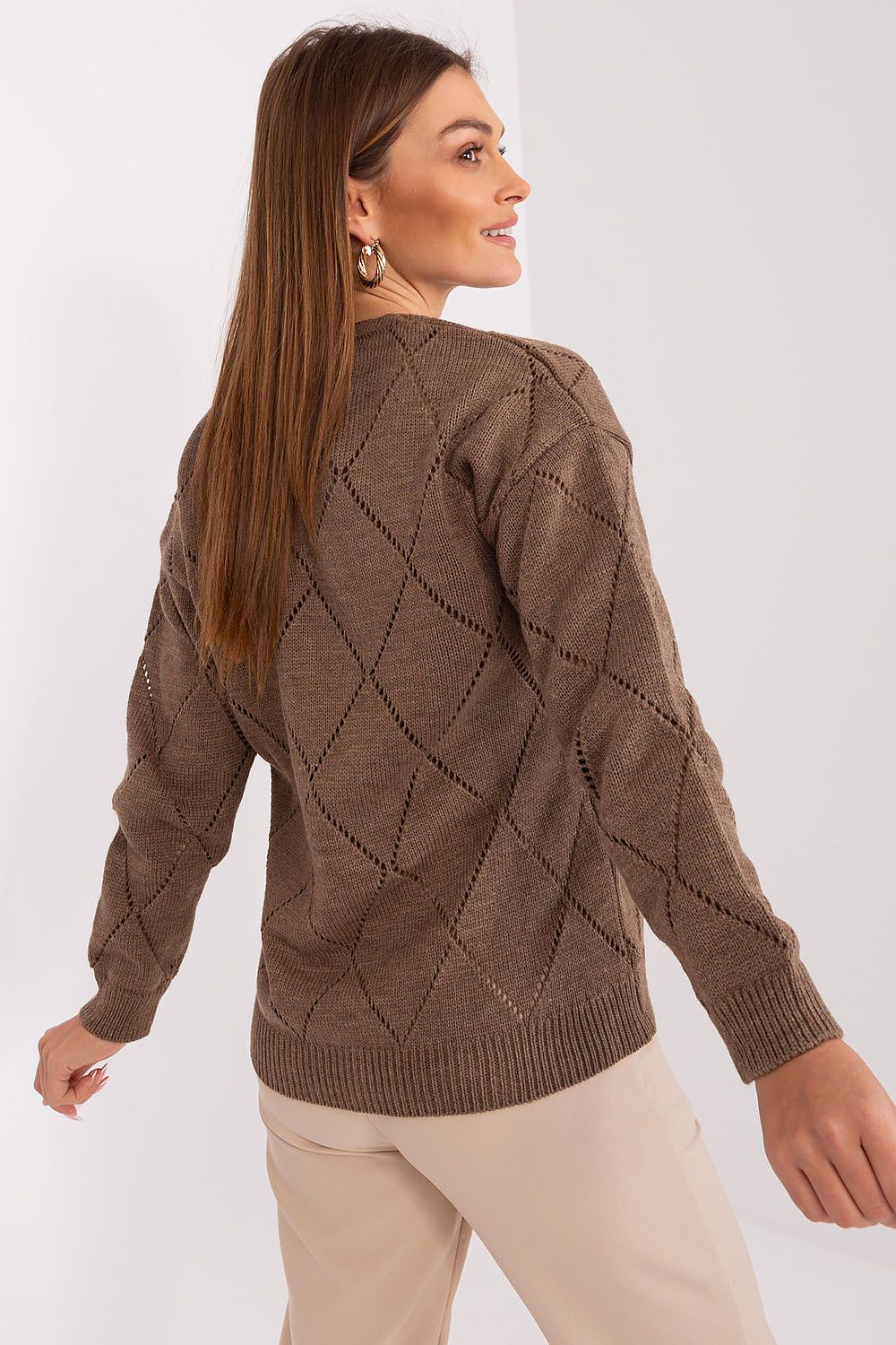 Cozy yet elegant Rue Paris women's cardigan, illustrating the perfect blend of acrylic and wool, with a subtle lace pattern for added sophistication and comfort.