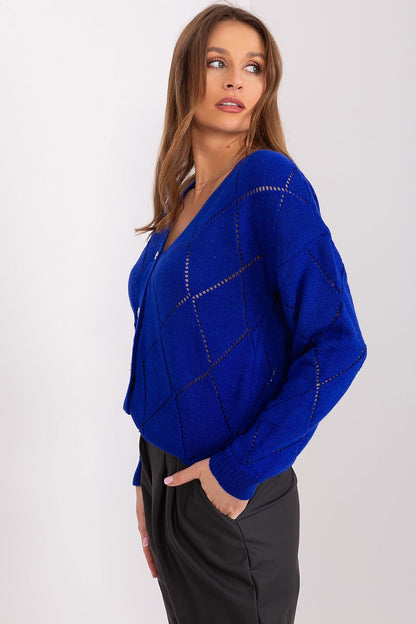 Luxurious women's cardigan by Rue Paris featuring an elegant lace pattern and V-neck design, perfect for stylish layering.