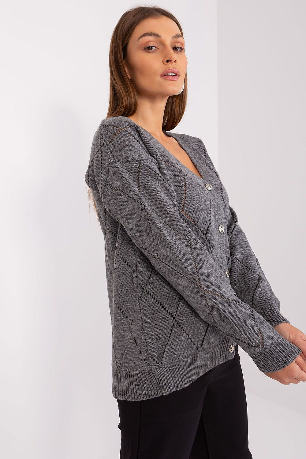 Stylish V-neck cardigan for women by Rue Paris, crafted from a soft acrylic and wool blend, exemplifying elegance in design.