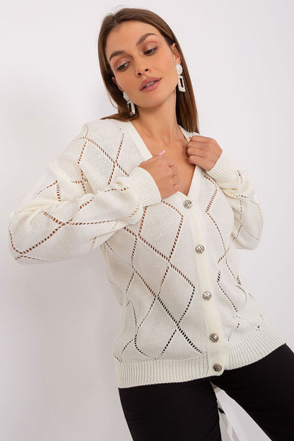 Stylish and lightweight women's cardigan by Rue Paris, featuring a timeless lace pattern and standard length.