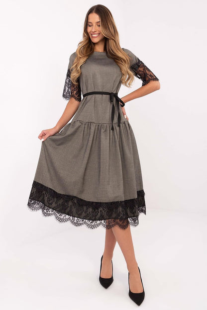 Elegant Wool Cocktail Dress by Lakerta featuring a stunning flared cut and delicate lace sleeves, perfect for formal events.