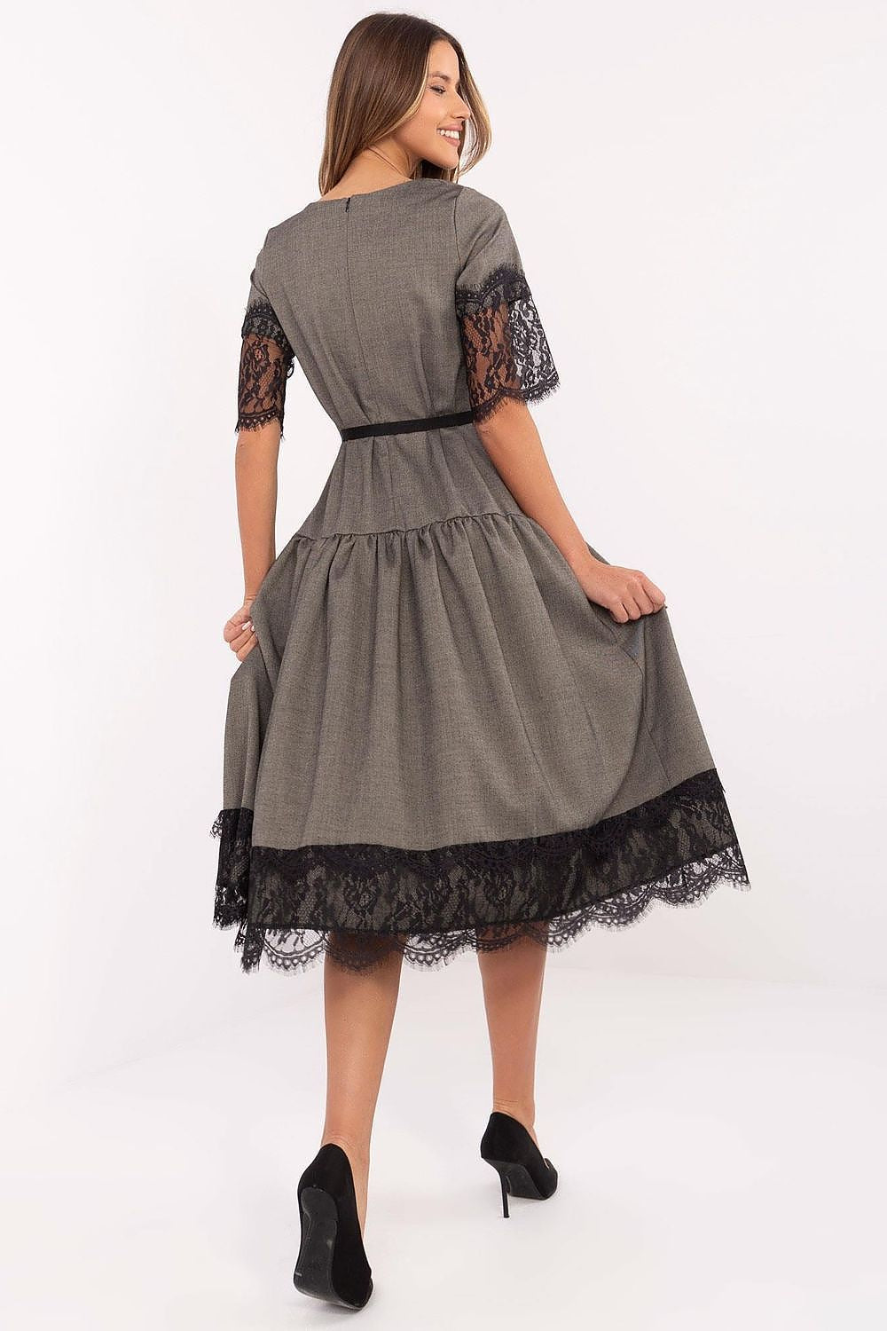 Side view of the Elegant Wool Cocktail Dress by Lakerta, highlighting the midi length and flattering silhouette.