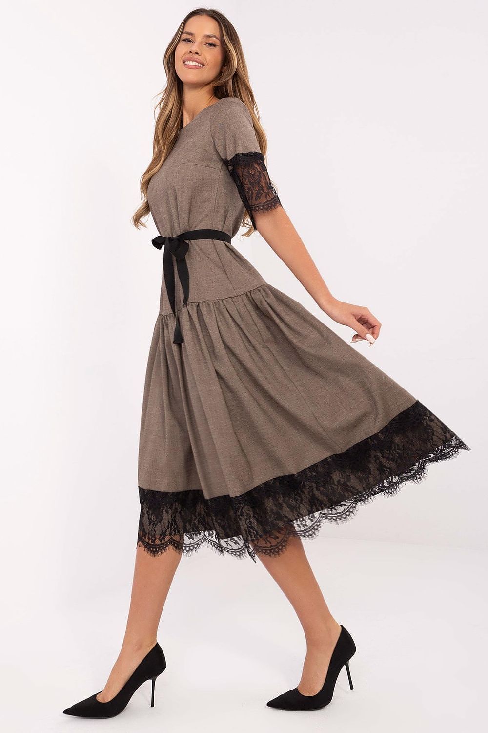 Model wearing the Elegant Wool Cocktail Dress by Lakerta, demonstrating its exquisite fit and timeless style for upscale occasions.