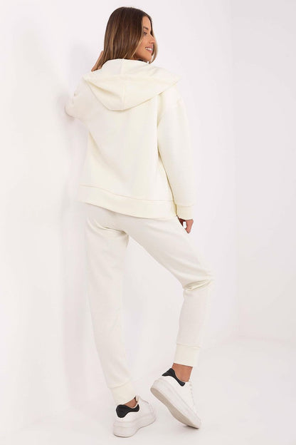 Lakerta Women's Tracksuit Set displayed on a model, highlighting its fashionable design suitable for casual and sporty occasions with an upscale feel.