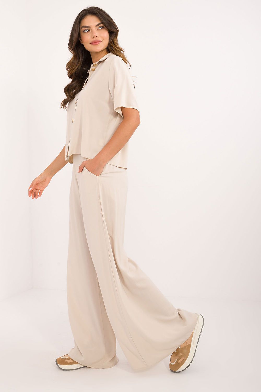 Close-up of Lakerta's classic cut shirt with short sleeves, collar, and button fastening, crafted from breathable viscose, designed for timeless elegance and all-day comfort.