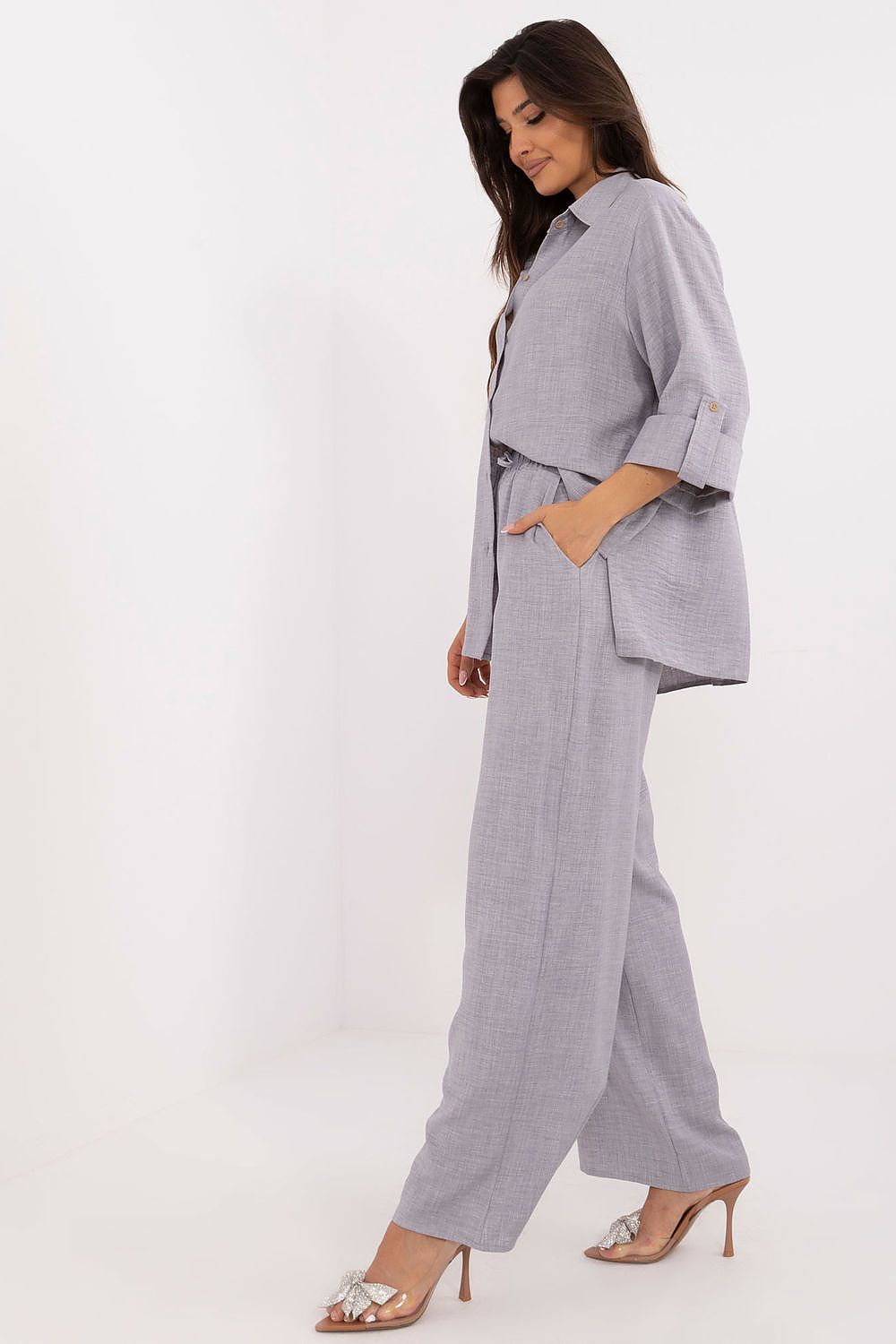 High waist trousers from Lakerta's women's set, showcasing a sophisticated silhouette and practical side pockets, ideal for an elegant outfit.