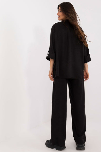 Elegant women's set by Lakerta featuring a stylish 3/4 sleeve buttoned shirt and high waist trousers, crafted from a luxurious cotton and polyester blend for ultimate comfort and sophistication.