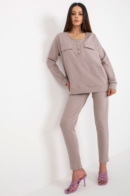 Lakerta tracksuit set modelled by a woman, illustrating the perfect fit and luxurious style suitable for casual or workwear.