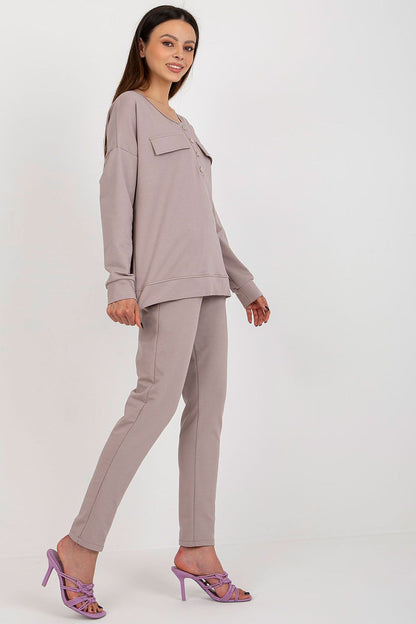 Fashionable women's luxury tracksuit set from Lakerta, highlighting its versatile design with practical side pockets and a smooth pattern ideal for elevating everyday wear.