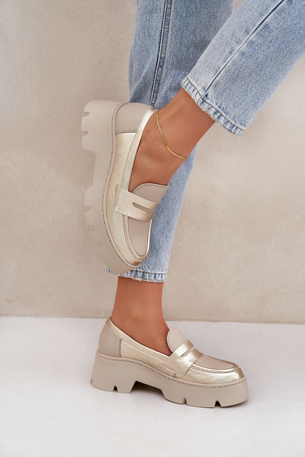 Elegant women's natural leather moccasins by Step in Style featuring a stylish platform and flat heel design, available in sizes EU 36-41. Perfect blend of comfort and luxury.