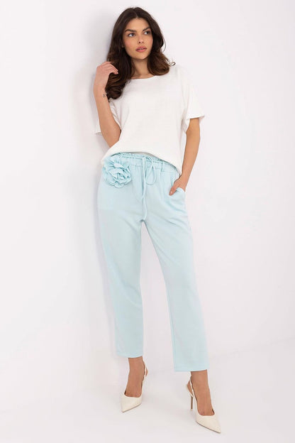 Luxury high-waisted tracksuit trousers for women by Italy Moda, featuring elegant design, detachable brooch, and comfortable fit for both casual and formal wear.