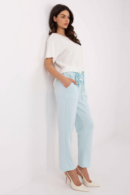 Chic women's tracksuit trousers with straight legs, high waist, and practical tie by Italy Moda, crafted from premium materials for a sophisticated look.