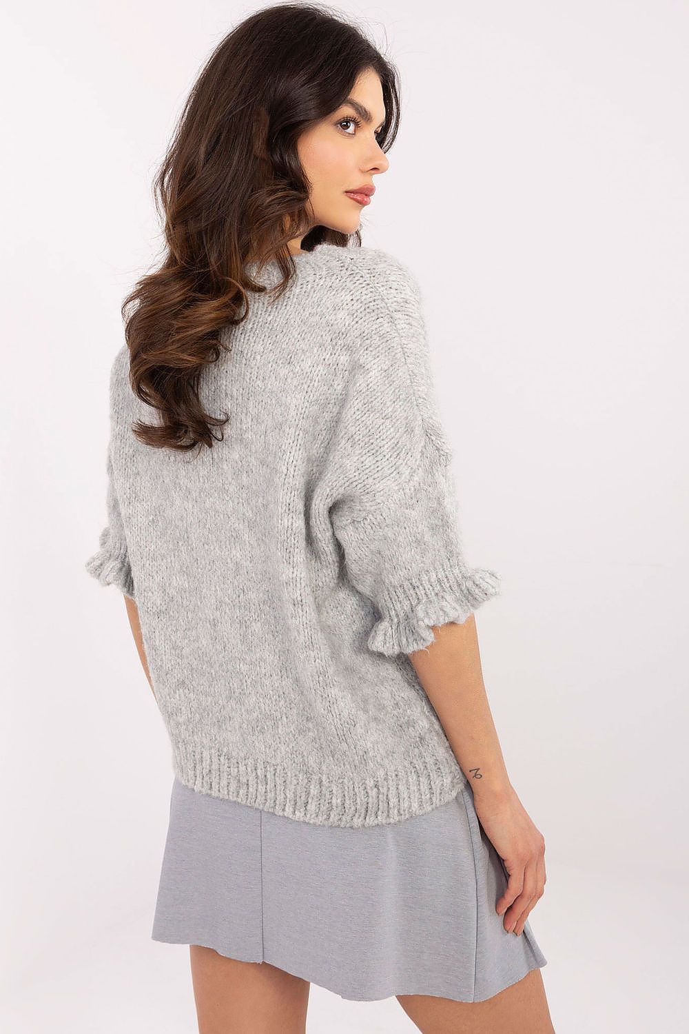 Elegant women's sweater with ruffle sleeves by Italy Moda, showcasing a soft acrylic-wool blend in a stylish design.