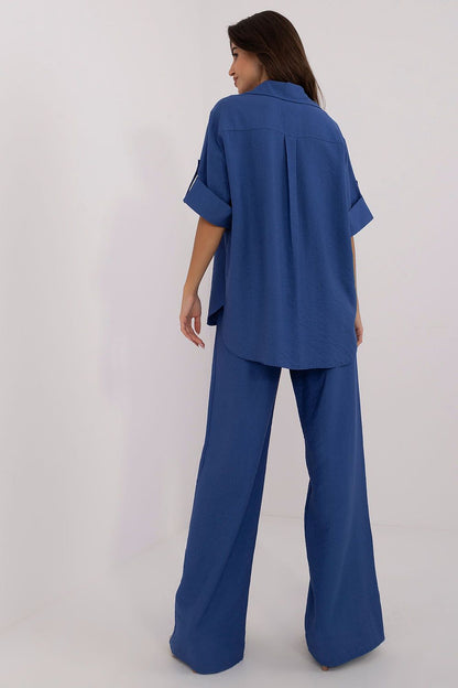Elegant women's linen set by Lakerta featuring a loose-fitting 3/4 sleeve shirt and high-waisted wide leg pants, ideal for chic casual wear.