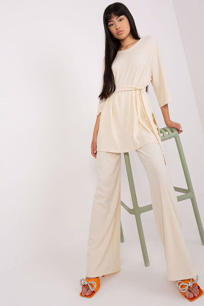 Lakerta Women's Ribbed Set featuring a stylish 3/4 sleeve blouse paired with high-waisted wide pants, showcasing elegant minimalism for casual luxury.