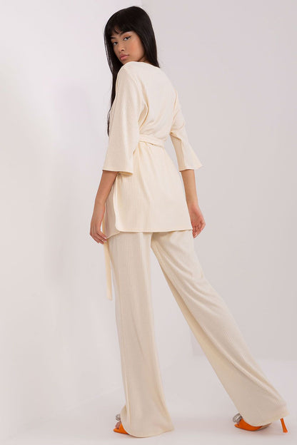 Detail shot of Lakerta Women's Ribbed Set, displaying the chic tie belt and side pockets for functionality in a luxurious everyday outfit.