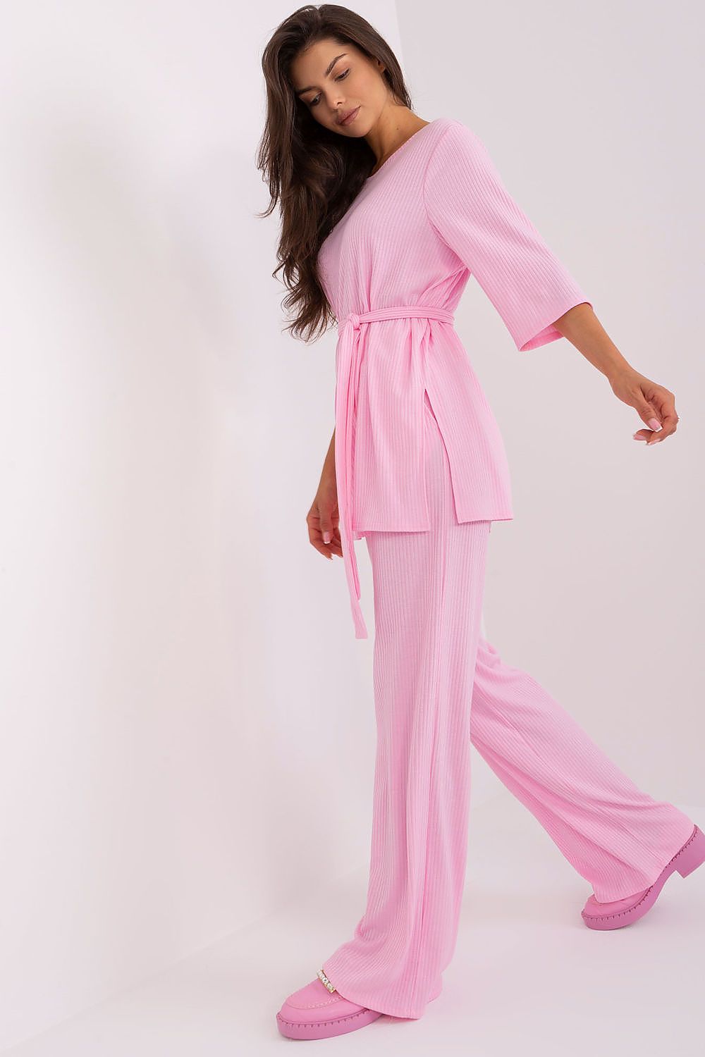 Stylish Lakerta high-waisted wide pants in S/M size, featuring a tie belt and side pockets, perfect for a fashionable and comfortable look.