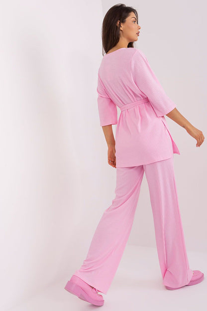 Complete look of the Lakerta women's ribbed set, consisting of a 3/4 sleeve blouse and high-waisted pants, exemplifying modern elegance and casual luxury.