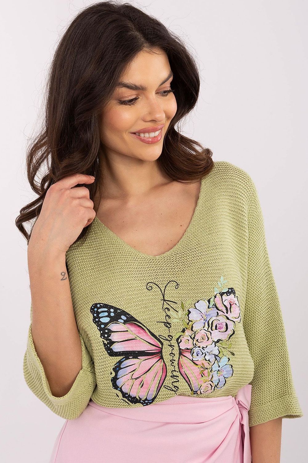Close-up view of the butterfly print on the elegant women's sweater from Italy Moda, showcasing the intricate design and quality fabric of a cotton-acrylic blend.