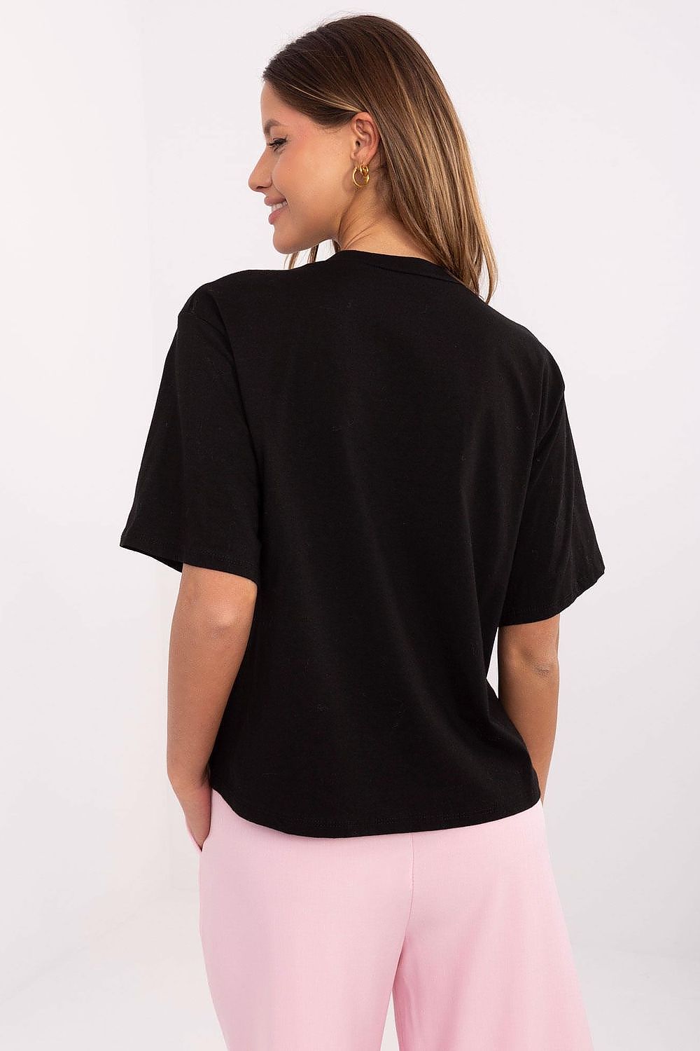 Elegant display of Italy Moda women's casual t-shirt featuring a sophisticated look with its standard length and stylish silhouette, ideal for modern wardrobes.