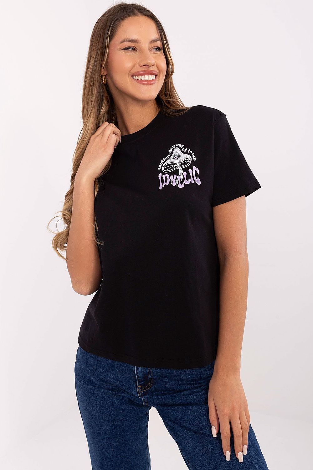 Elegantly styled Sublevel Women's Classic Cotton T-Shirt in a soft hue, featuring a chic slogan print, perfect for sophisticated casual wear.