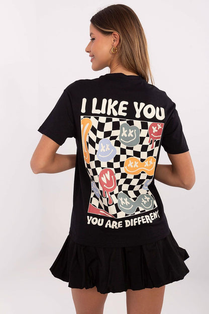 Model wearing Sublevel Women's T-Shirt, demonstrating its round neckline and short sleeves, a luxurious blend of comfort and style.