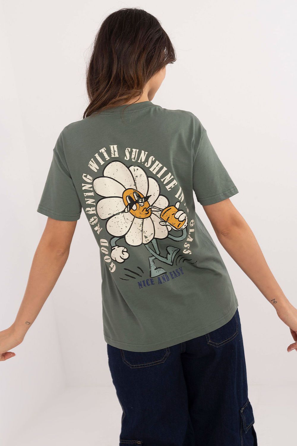 Back view of the Sublevel luxury women's t-shirt highlighting the unique decorative print and dynamic captions for a fashionable touch.