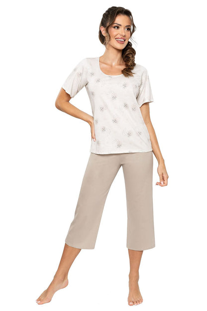 Luxury women's cotton pyjamas set by Donna featuring a stylish short-sleeve blouse and comfortable 3/4 length pants in muted colours for elegant sleepwear.