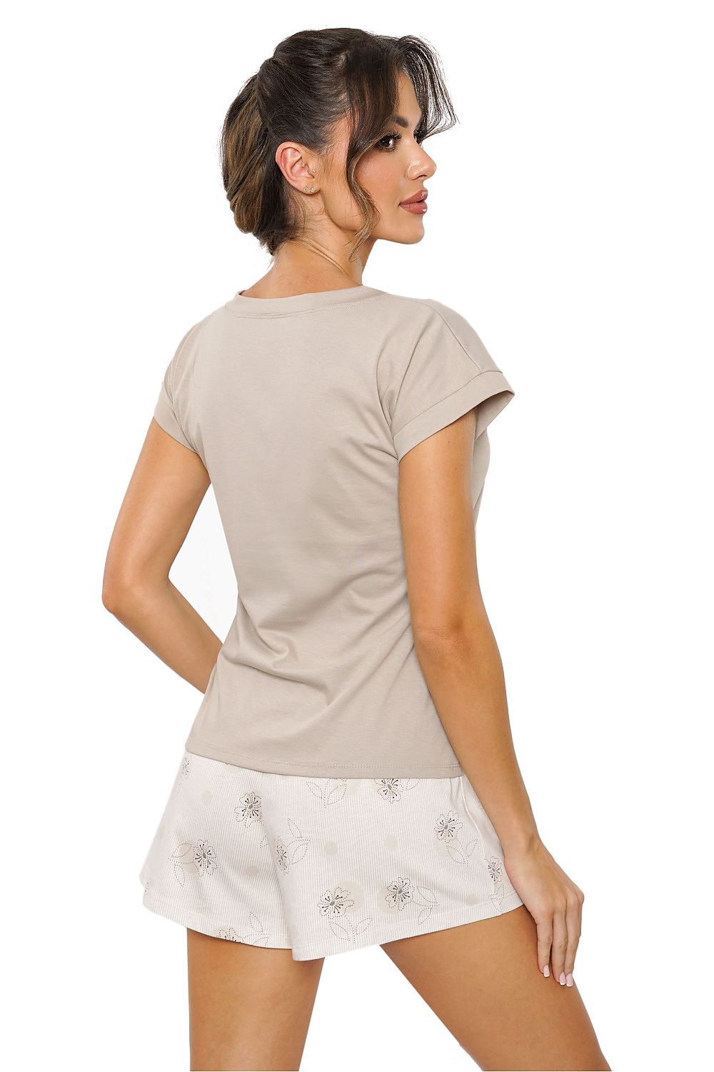 Comfortable and chic cotton pyjamas by Donna, designed with a loose fit and decorative bow shorts for an elegant touch.