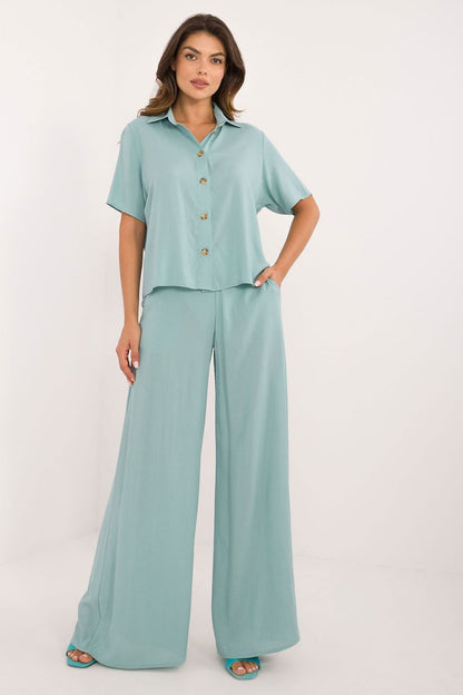 Elegant Viscose Set by Lakerta highlighting the beautiful silhouette with wide trousers and a chic shirt.